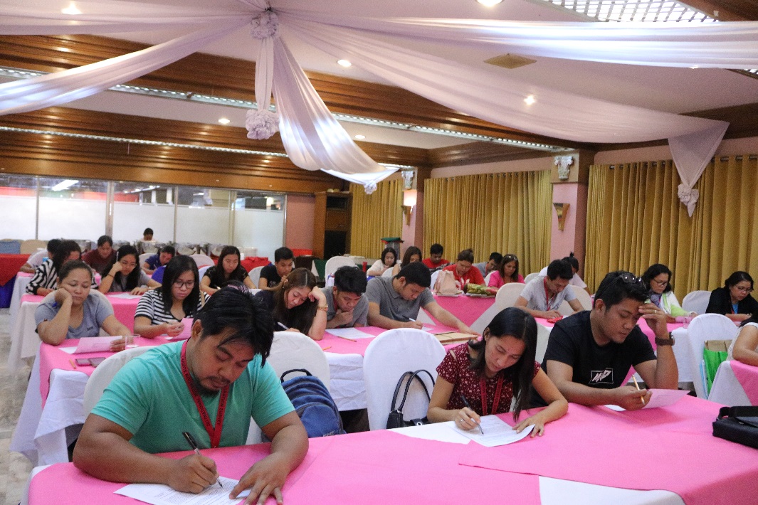 Field workers for the adjacent Regions 10 and 13 take an exam which tests their comprehension skills of the survey materials during their NMS training in Cagayan de Oro[Cagayan de Oro City, Misamis Oriental;  in June 2018]